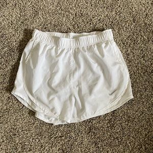 white nike running shorts